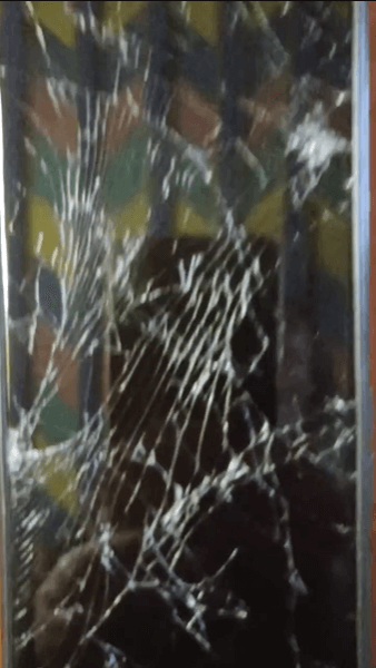 Broken phone of Gonmo Kyi containing evidence of police brutality