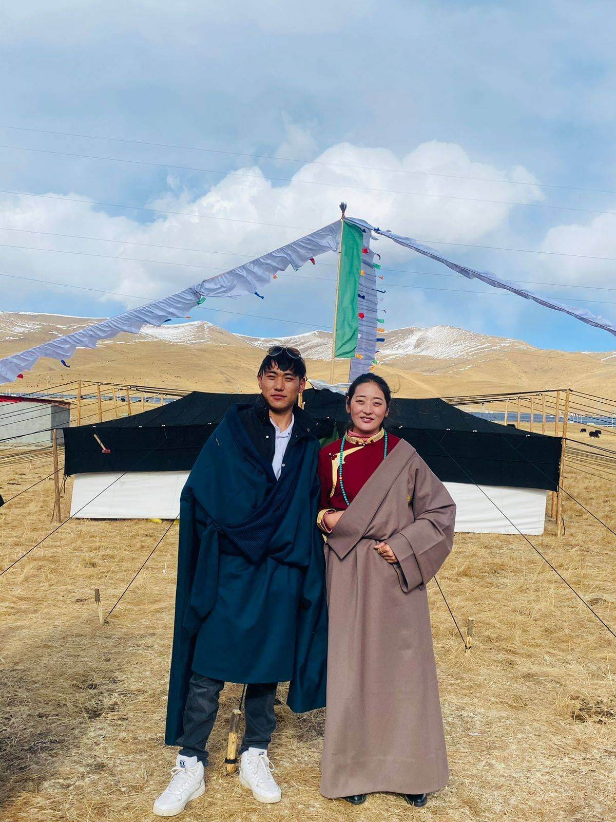 Counsins Gendun Phuntsok and Namkyi reunite after release from prison and pose for photo