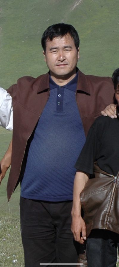 Dorjee Tashi during a group photo after offering prayers for success on a mountaintop prior to his arrest in 2008. Photo: ICT.