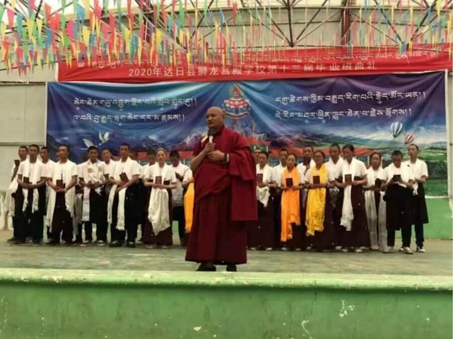 Khandrul Jigme Kunsang Gyaltsen giving a speech during 2020’s graduation ceremony of Sengdruk Taktse Middle School which was forcibly shut in July 2021. (Photo Radio Free Asia)