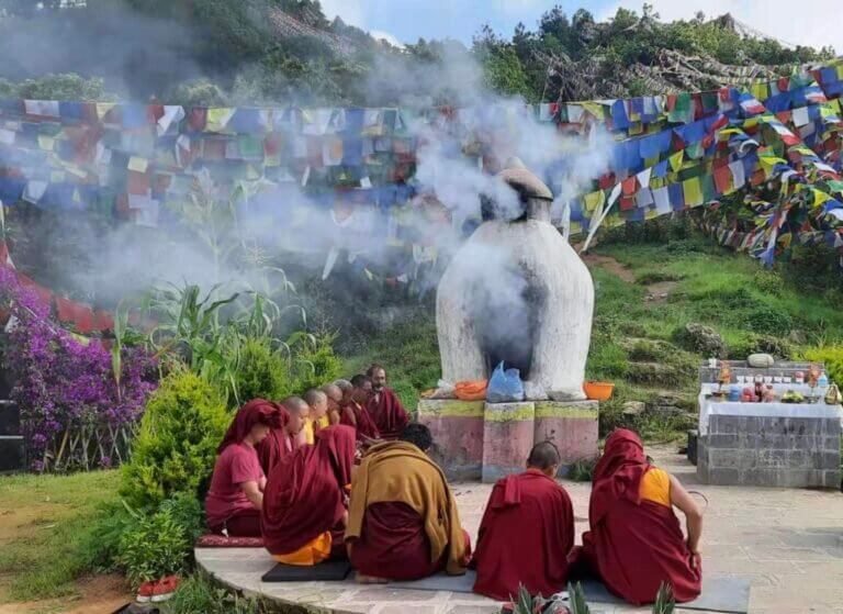 Representative Image of Tibetan monks making prayer and incense offerings. Image credit: Samye Institute