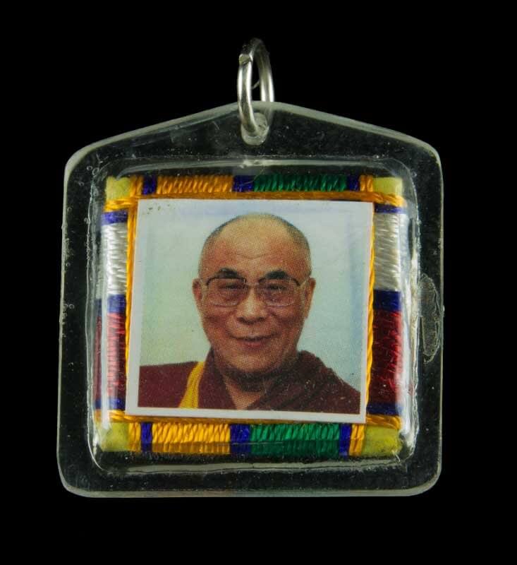 Representative image of an amulet carrying the Dalai Lama’s photo