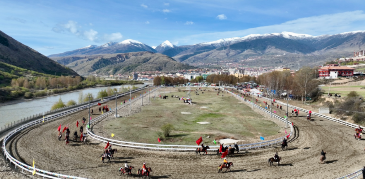 Horseback parade with mandatory Chinese flag-raising in Drago County May 2025. Image source: People’s Daily Sichuan Channel.