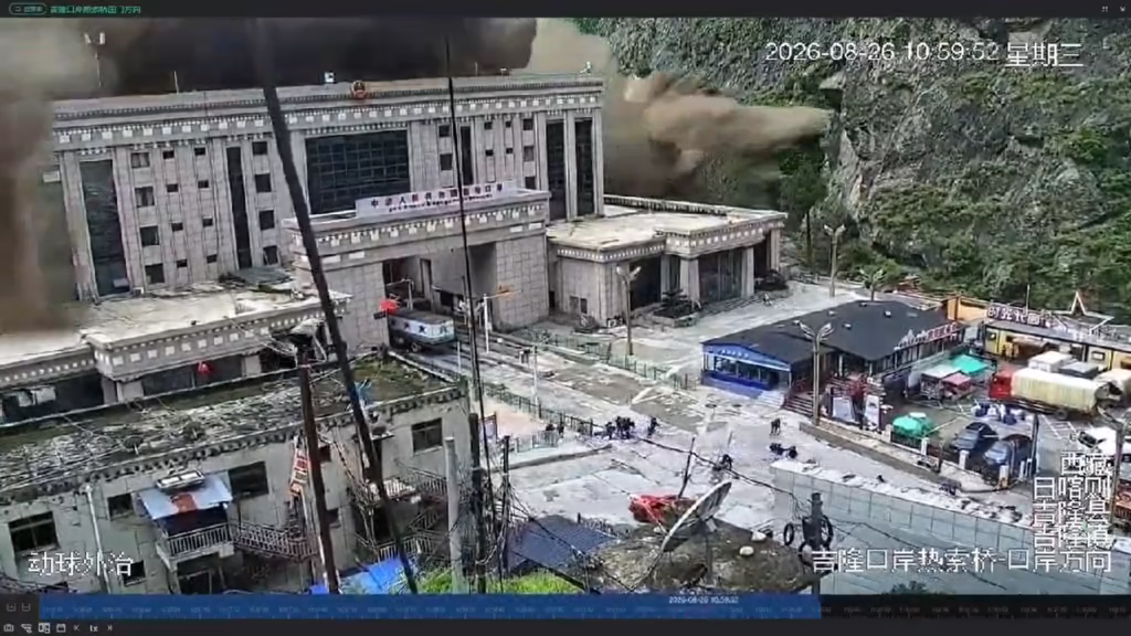 Cameras captured the terrifying moment that flash floodinghit the Tibet-Nepal border crossing.